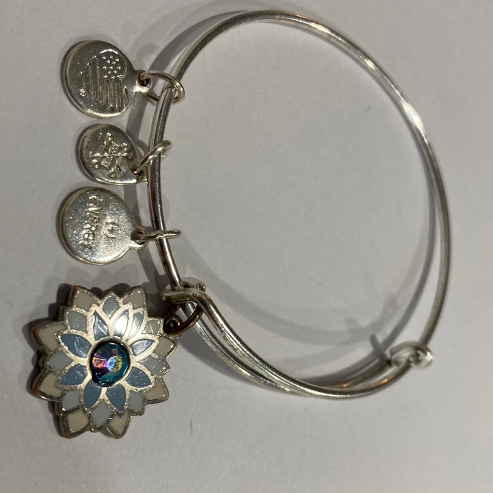 Alex and ani silver tone finished charm bracelet with blue crystal adorned Lily.